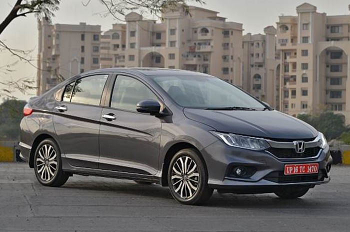Upsizing tyres on a old Honda City - which tyre size should you go for? Honda City 4th-gen front quarter